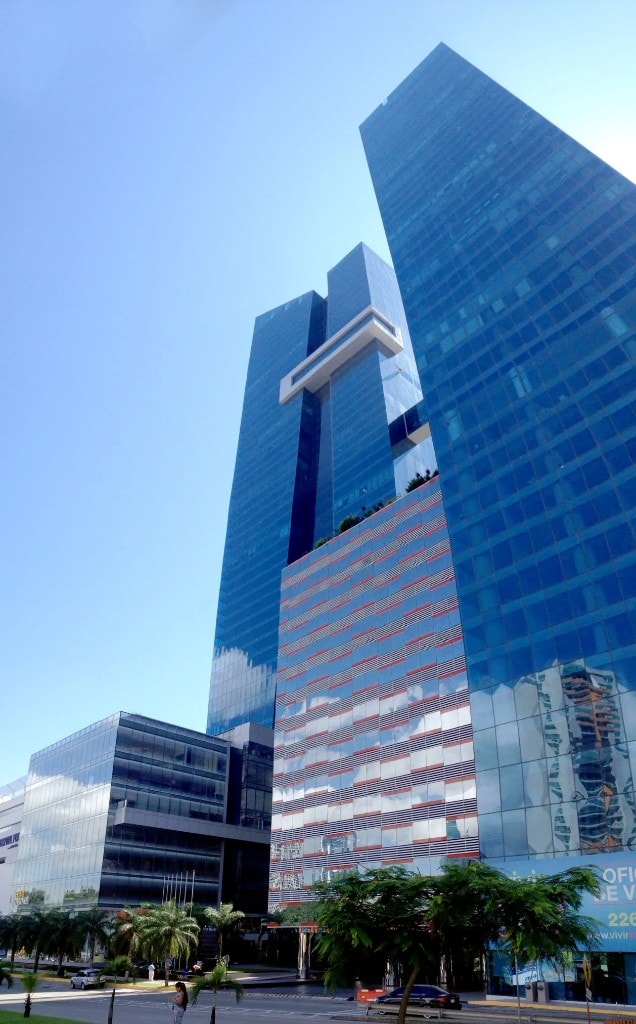 Contemporary glass skyscrapers against a clear blue sky